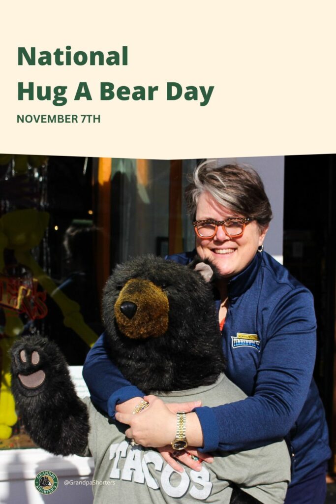 National Hug a Bear Day - Jennifer Shorter hugs Carlos the Bear at Grandpa Shorters in Petoskey