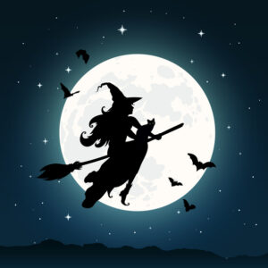 Witch flying on broomstick in night sky